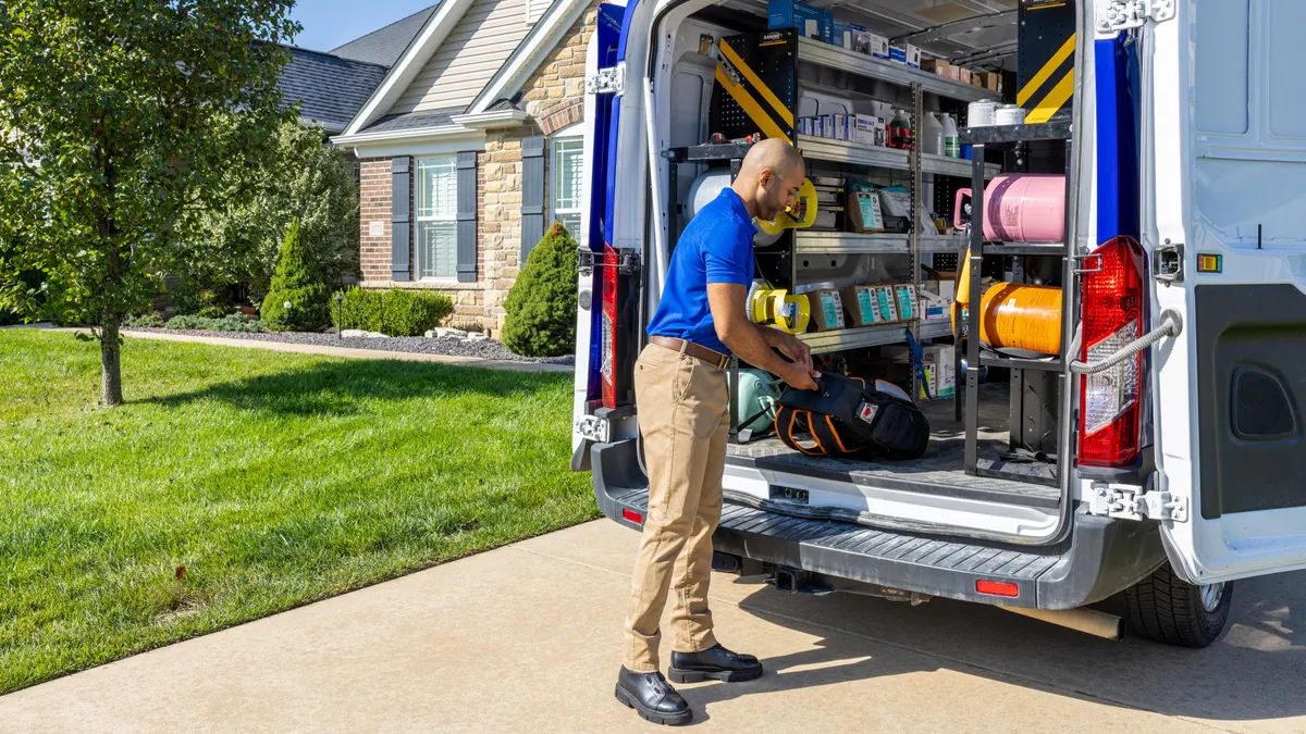 Home-service contractor preparing for a local job
